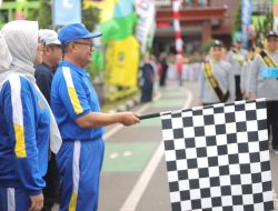 Pj Wali Kota Bekasi Sambut Antusias Lomba Gerak Jalan Kolaborasi dengan Bank BJB